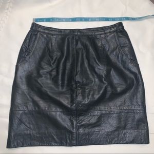 Vintage black leather mini-skirt with pockets